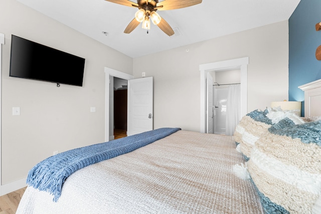 bedroom featuring light hardwood / wood-style floors and ceiling fan