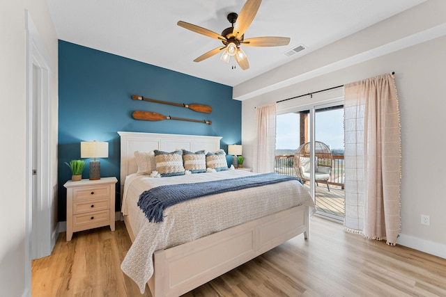 bedroom featuring ceiling fan, light hardwood / wood-style floors, and access to exterior