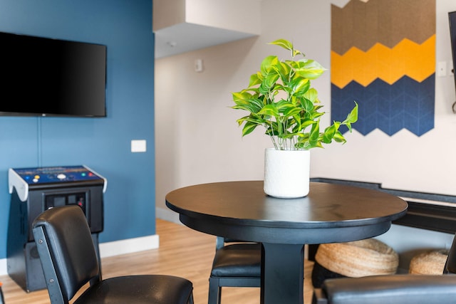 dining space featuring hardwood / wood-style flooring