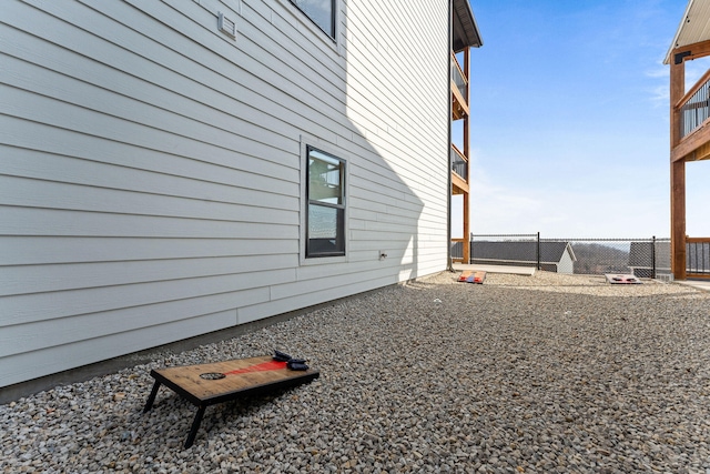 view of side of property with a patio area