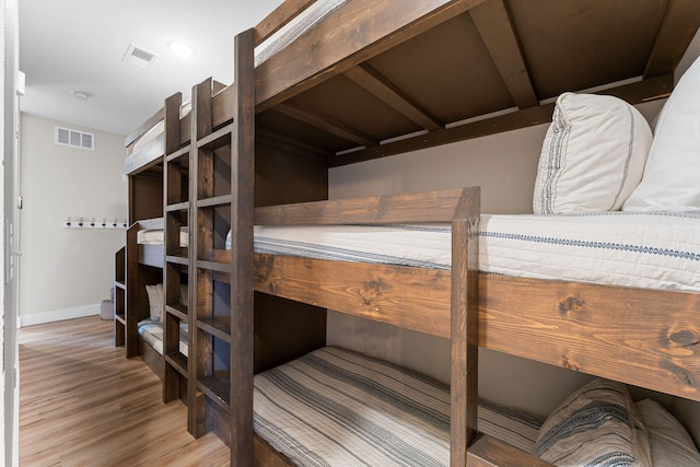 bedroom with light wood-type flooring