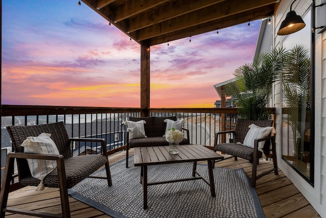 deck at dusk with a water view