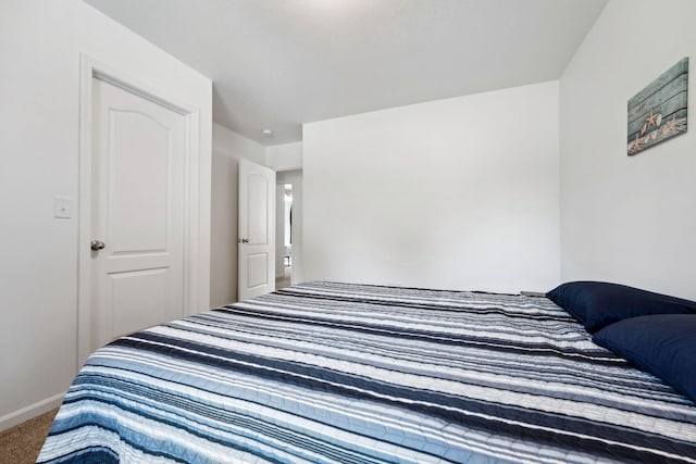 bedroom featuring carpet flooring