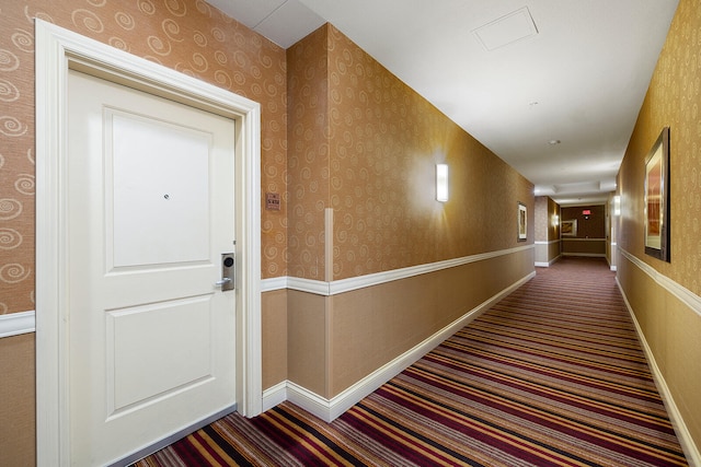 hallway featuring carpet floors