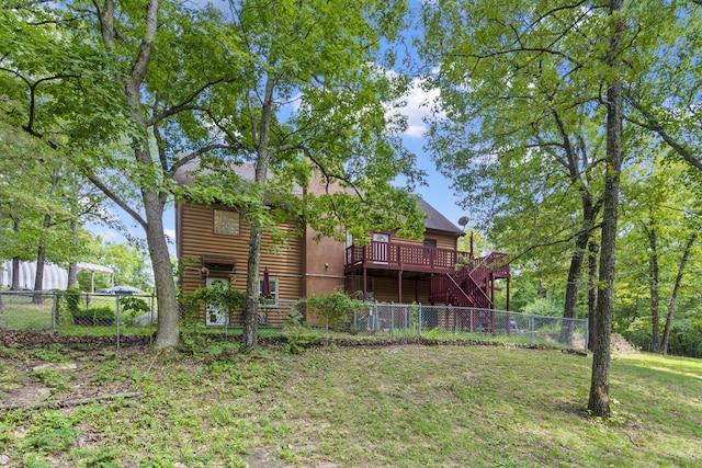 view of yard featuring a wooden deck