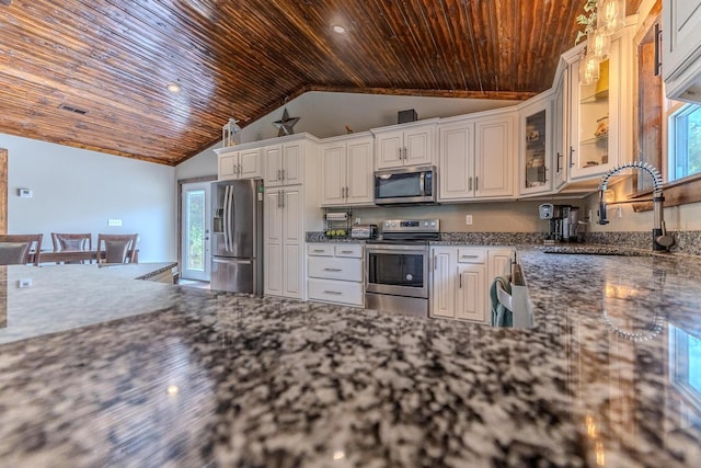 7084 Logan Rd, Hartville, MO 65667 - kitchen featuring a sink, glass insert cabinets, wood ceiling, a wealth of natural light, and stainless steel appliances