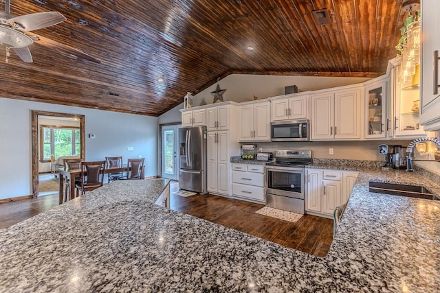 kitchen featuring wooden ceiling, sink, dark hardwood / wood-style floors, appliances with stainless steel finishes, and white cabinetry