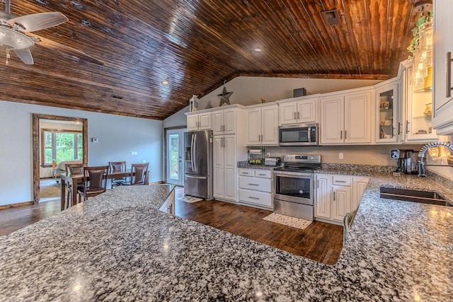 7084 Logan Rd, Hartville, MO 65667 - kitchen with stainless steel appliances, a sink, dark wood-style flooring, light stone countertops, and wooden ceiling