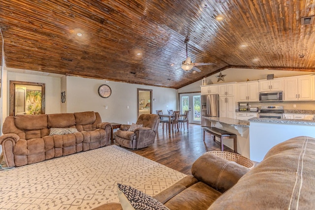 living room with ceiling fan, lofted ceiling, dark hardwood / wood-style flooring, and wooden ceiling