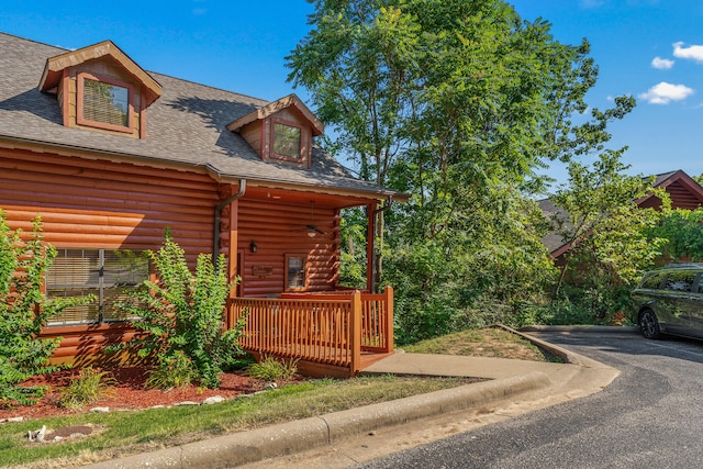 view of home's exterior featuring covered porch