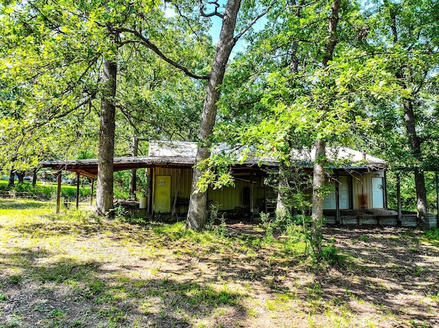 exterior space featuring a carport