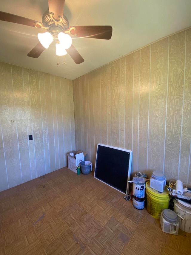 unfurnished room featuring parquet flooring and ceiling fan