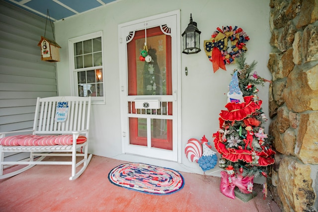 property entrance featuring covered porch