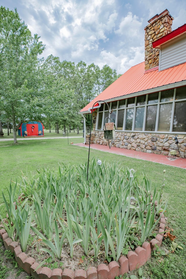 view of yard featuring a sunroom