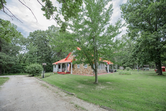 exterior space featuring a front lawn