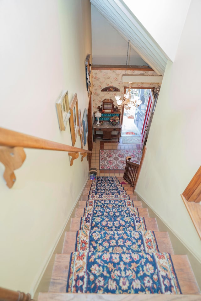 stairway featuring tile patterned floors