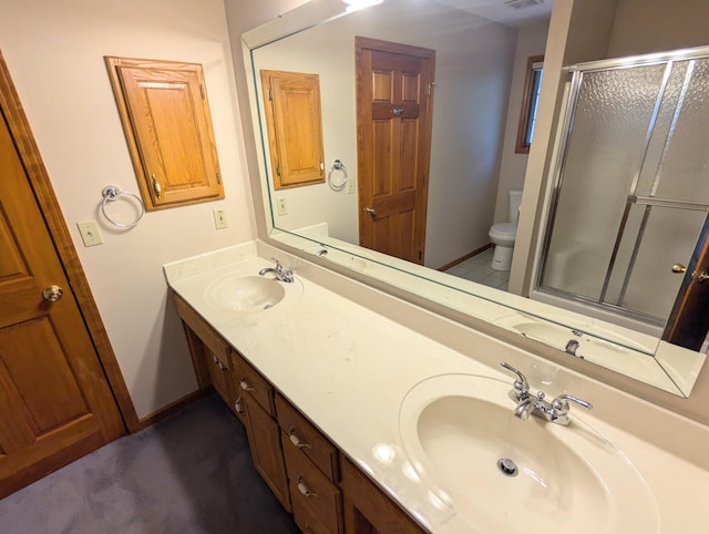 bathroom featuring walk in shower, vanity, and toilet