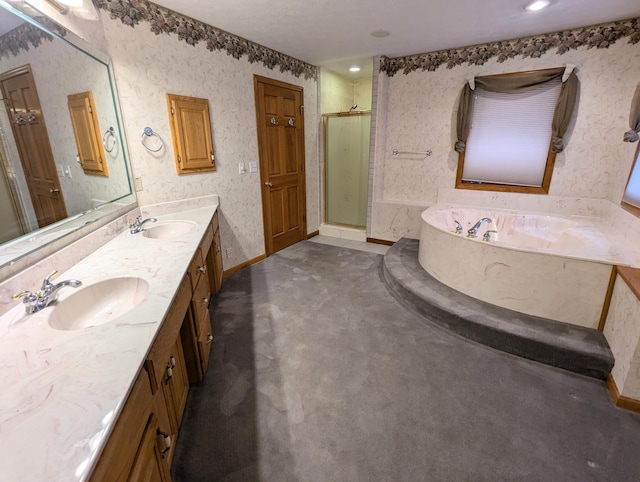 bathroom featuring shower with separate bathtub and vanity