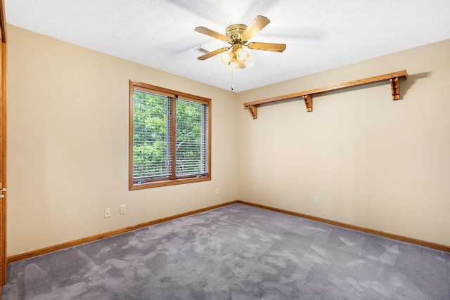 127 Kachina Trl, Branson West, MO 65737 - carpeted spare room featuring baseboards and a ceiling fan