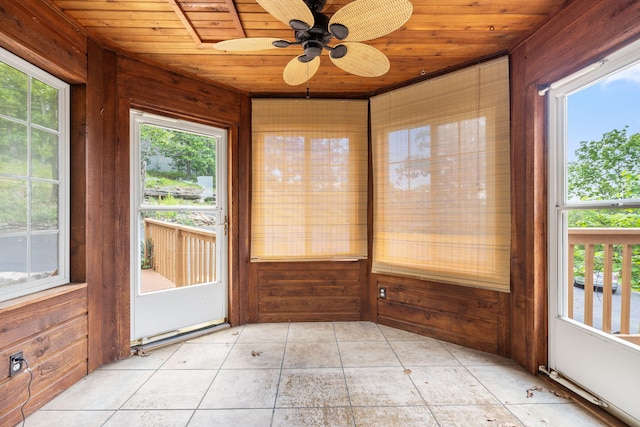 127 Kachina Trl, Branson West, MO 65737 - unfurnished sunroom with a ceiling fan, wooden walls, tile patterned flooring, and wood ceiling