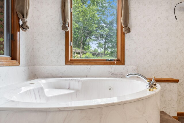 127 Kachina Trl, Branson West, MO 65737 - bathroom featuring a tub with jets