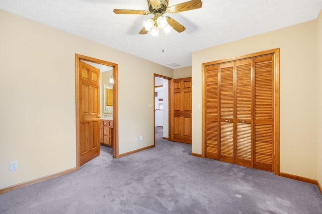 127 Kachina Trl, Branson West, MO 65737 - unfurnished bedroom with a closet, carpet floors, baseboards, and ceiling fan