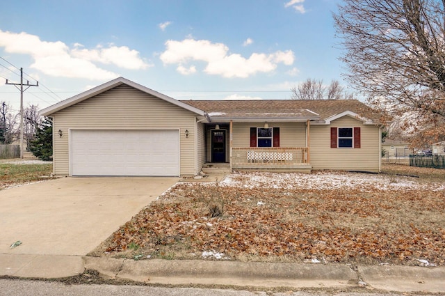 ranch-style house with covered porch and a garage