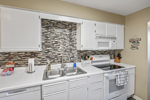 170 Bunker Ridge Dr Unit 6, Branson, MO 65616 - kitchen with light countertops, white appliances, a sink, and backsplash