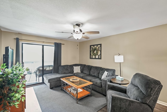 170 Bunker Ridge Dr Unit 6, Branson, MO 65616 - living area with wood finished floors and a ceiling fan