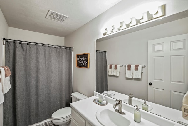 170 Bunker Ridge Dr Unit 6, Branson, MO 65616 - full bath with visible vents, toilet, and vanity