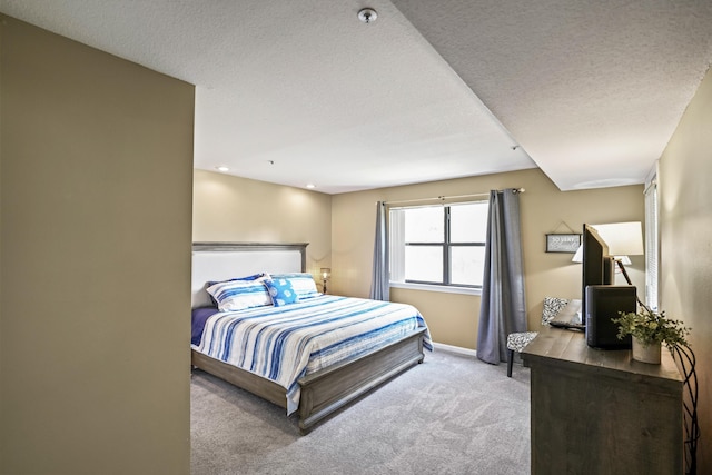 170 Bunker Ridge Dr Unit 6, Branson, MO 65616 - bedroom featuring carpet, a textured ceiling, and baseboards