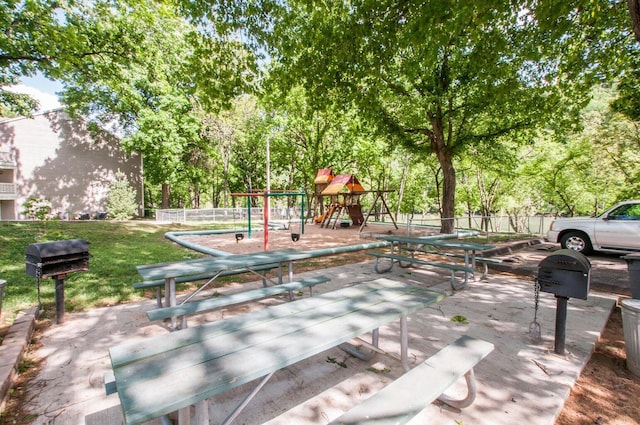 view of patio featuring a playground