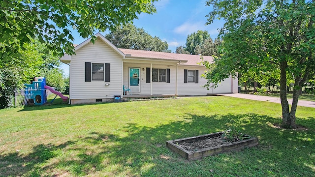 ranch-style home with a playground and a front lawn