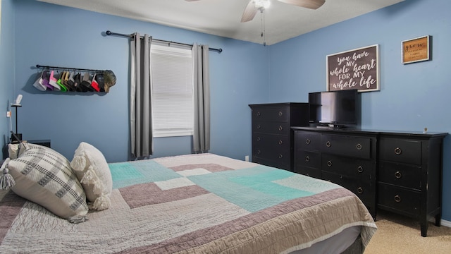 carpeted bedroom with ceiling fan