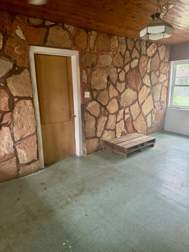 interior space with wood ceiling