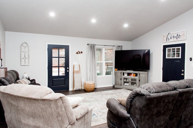 living room featuring lofted ceiling, baseboards, recessed lighting, and dark wood-type flooring