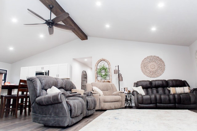living area featuring recessed lighting, a ceiling fan, and vaulted ceiling with beams