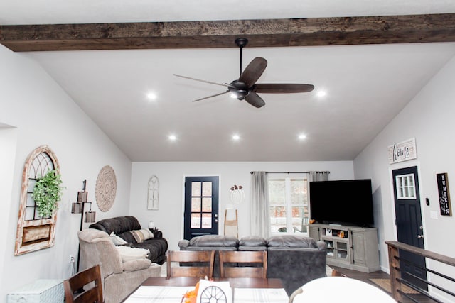 living area featuring a ceiling fan, vaulted ceiling with beams, and recessed lighting
