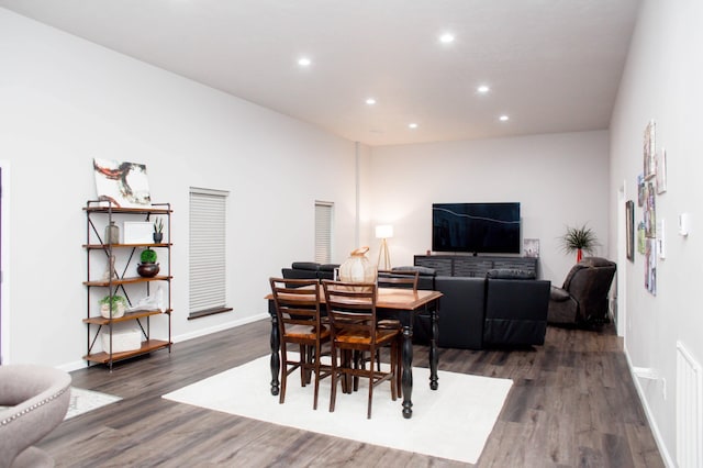 dining area with recessed lighting, baseboards, and dark wood-style floors