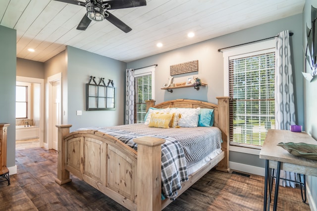 bedroom featuring ceiling fan, wood ceiling, dark hardwood / wood-style floors, and multiple windows