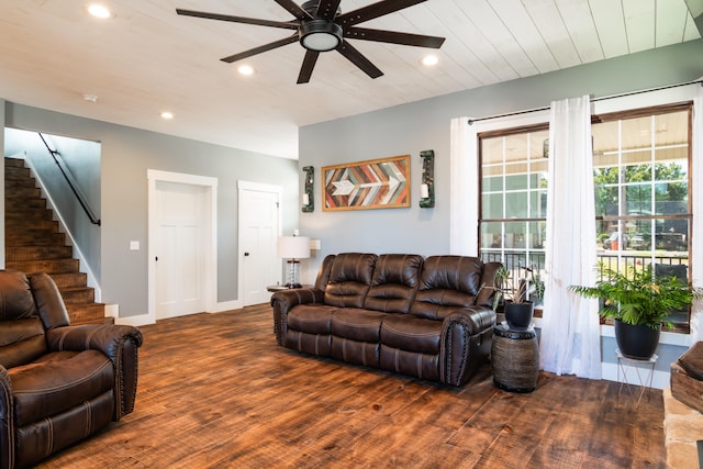 living room featuring ceiling fan, wood ceiling, and dark hardwood / wood-style floors