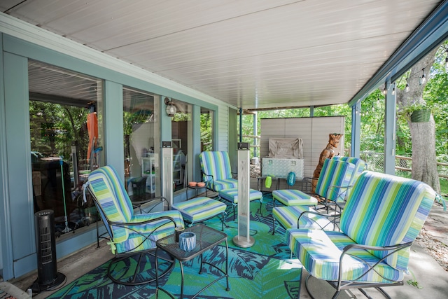 sunroom featuring a healthy amount of sunlight