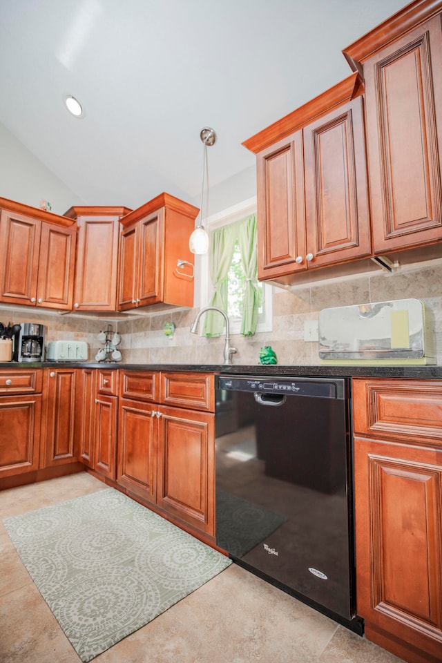 kitchen featuring pendant lighting, tasteful backsplash, vaulted ceiling, sink, and dishwasher