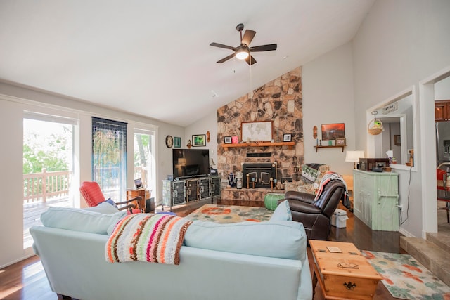 living room featuring ceiling fan, hardwood / wood-style floors, and high vaulted ceiling