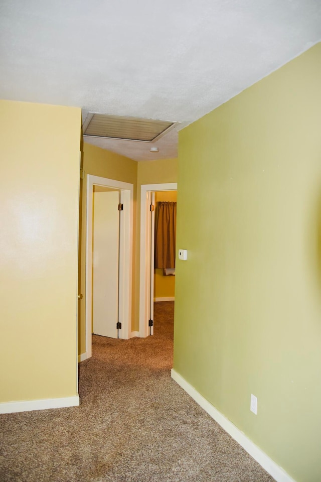 empty room with carpet flooring