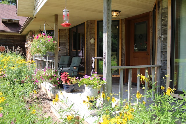 entrance to property with a porch