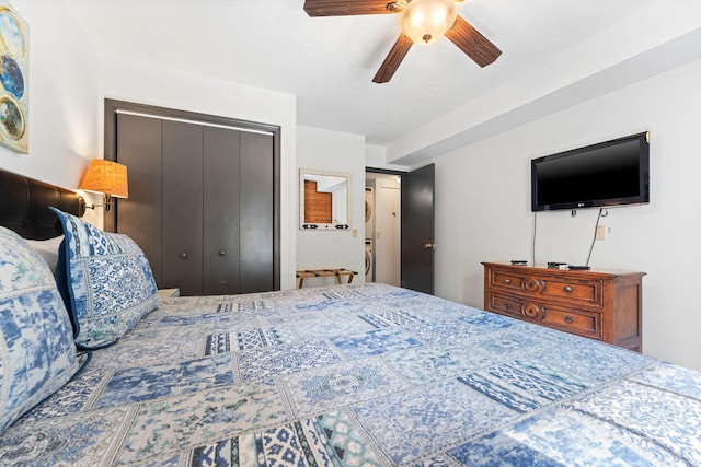 bedroom featuring ceiling fan and a closet