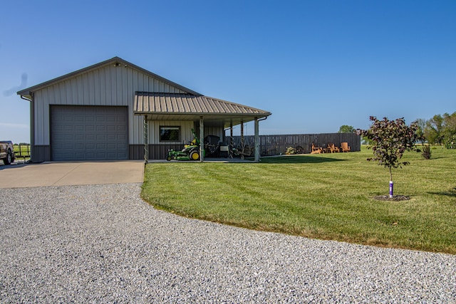 view of front facade with a front yard and a garage