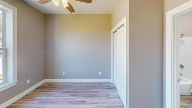 500 Timber Wolf Rd, Hollister, MO 65672 - unfurnished room with a ceiling fan, light wood-style flooring, and baseboards