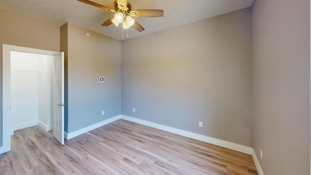 500 Timber Wolf Rd, Hollister, MO 65672 - unfurnished room with ceiling fan, baseboards, and light wood-type flooring